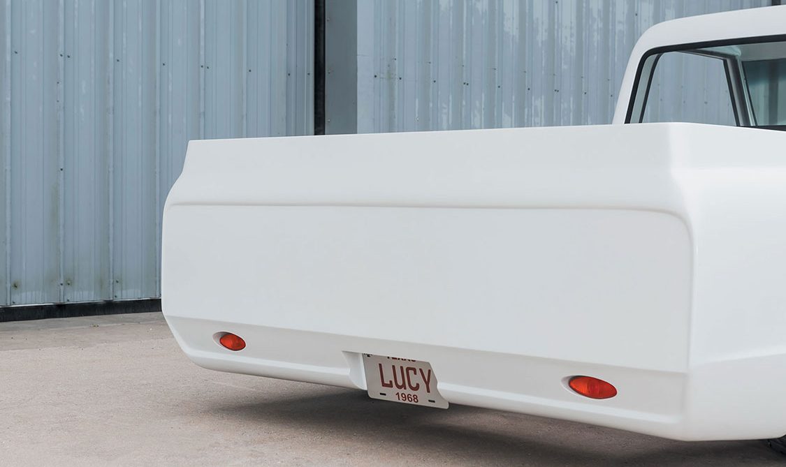 Lucy license plate on white 1968 pickup truck