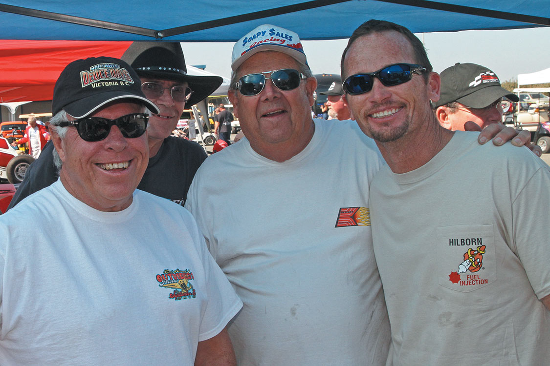 (L-R) artist Phil Whetstone, honoree Tommy Allen and Funny Car driver Jack Beckman