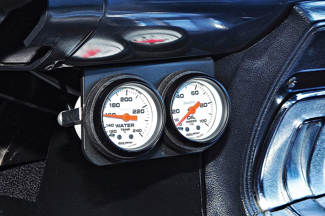 A set of aftermarket Autometer gauges