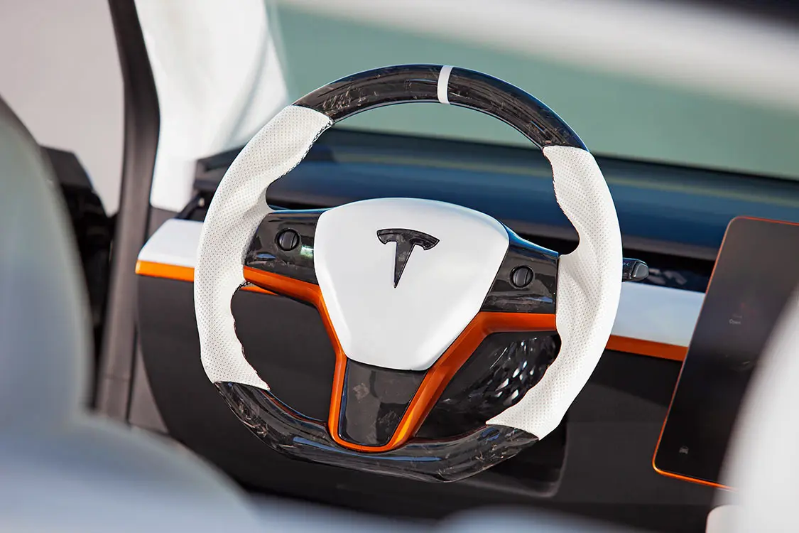 Motortopia- Striking Tesla Model Y Takes Center Stage
